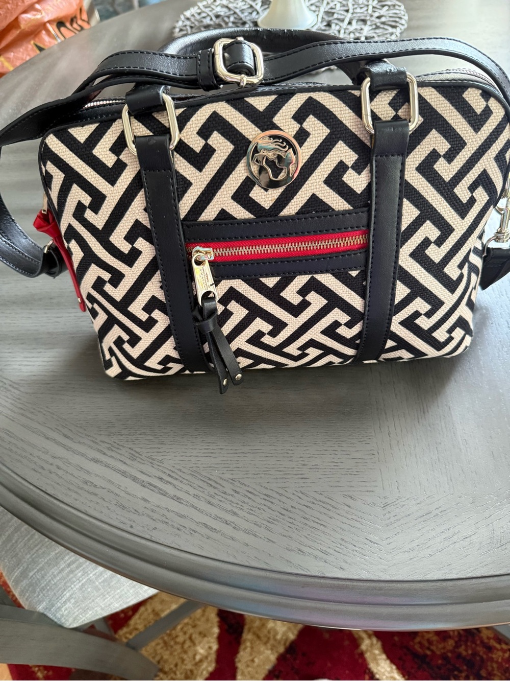 Black & Cream Geometric Shoulder Bag with Red Accent Zip